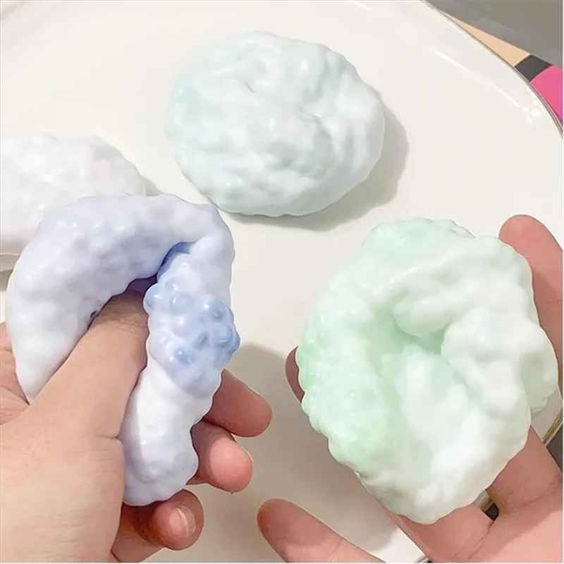 squishy balle texture mains