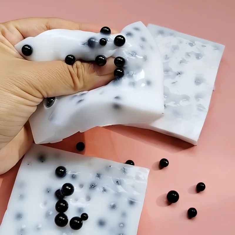 squishy billes cachees main homme